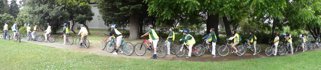 Middle School Landing Page photo showing several children on bikes along a bike path. 